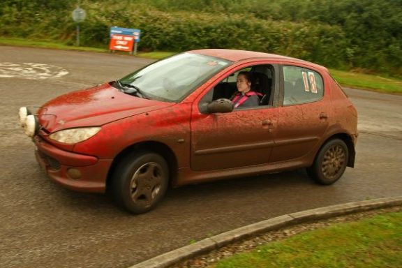Red Peugeot 206 rally car on South West Targa