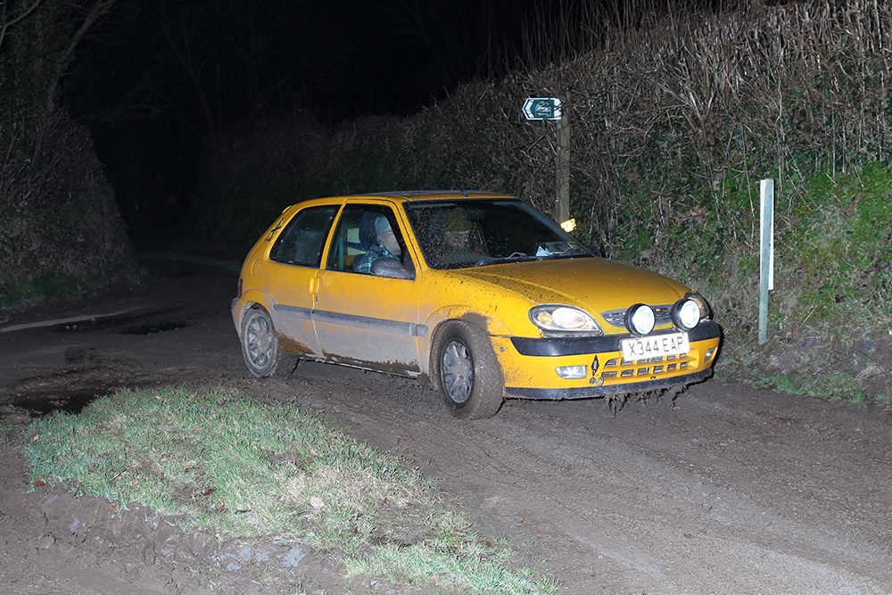 Peugeot 106 rally car on a night rally