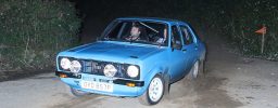 Blue MKII Ford Escort on night rally